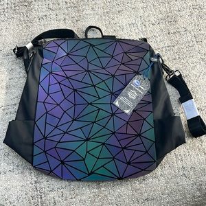 Ameri leather luminous backpack,new with tags.16” W X 15” T. Shoulder bag